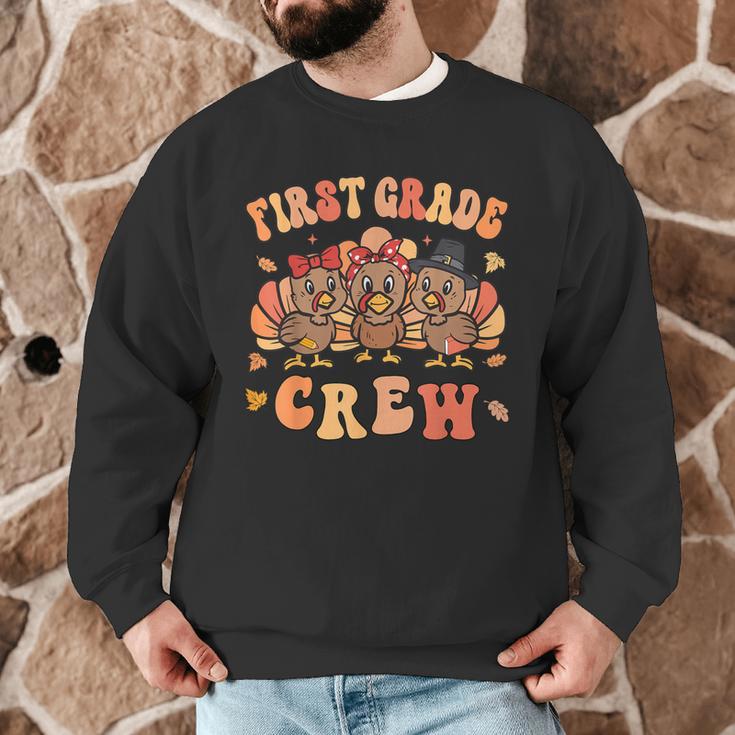 First Grade Crew Thanksgiving Fall Teacher 1st Grade Team Men Graphic Sweatshirt, novelty gifts, funny gifts
