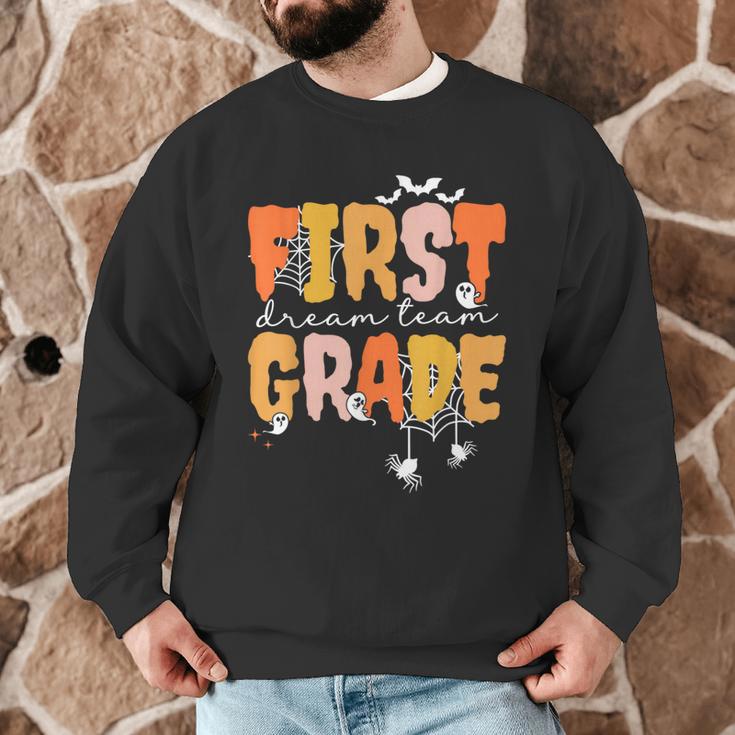 First Grade Dream Retro Team Fall Halloween Spooky Teachers Men Graphic Sweatshirt, novelty gifts, funny gifts