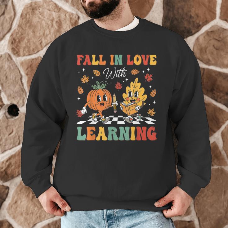 Groovy Fall In Love With Learning Autumn Pumpkin Teacher Men Graphic Sweatshirt, novelty gifts, funny gifts Groovy Fall In Love With Learning Autumn Pumpkin Teacher Men Graphic Sweatshirt, novelty gifts, funny gifts