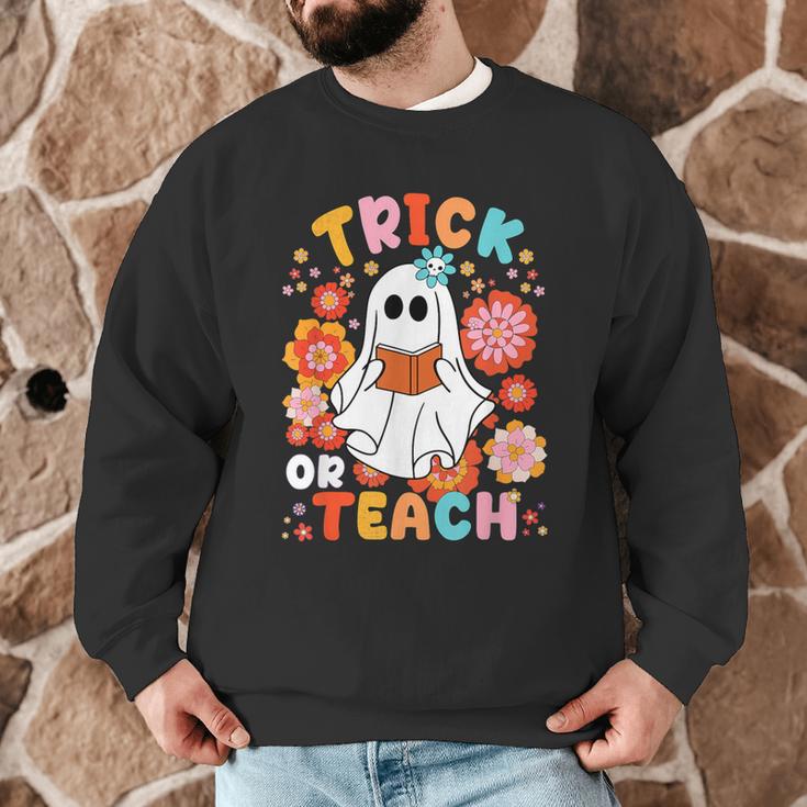 Groovy Halloween Trick Or Teach Retro Floral Ghost Teacher For Men Women Kids Men Graphic Sweatshirt, novelty gifts, funny gifts