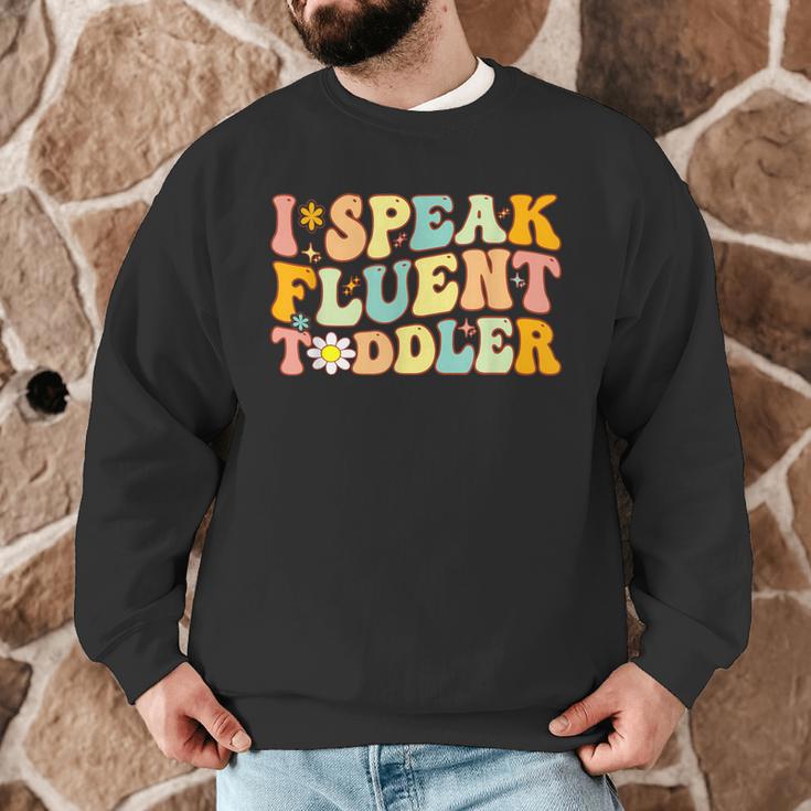 Groovy I Speak Fluent Toddler Daycare Provider Teacher Men Graphic Sweatshirt, novelty gifts, funny gifts Groovy I Speak Fluent Toddler Daycare Provider Teacher Men Graphic Sweatshirt, novelty gifts, funny gifts