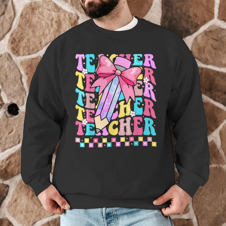 Groovy Teacher Cute Coquette Bow Flower Retro Back To School Men Graphic Sweatshirt, novelty gifts, funny gifts