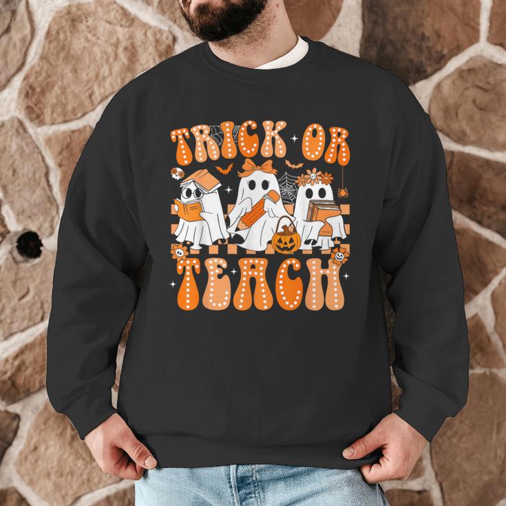 Groovy Teacher Halloween Trick Or Teach Ghost Men Women Kids Men Graphic Sweatshirt, novelty gifts, funny gifts Groovy Teacher Halloween Trick Or Teach Ghost Men Women Kids Men Graphic Sweatshirt, novelty gifts, funny gifts