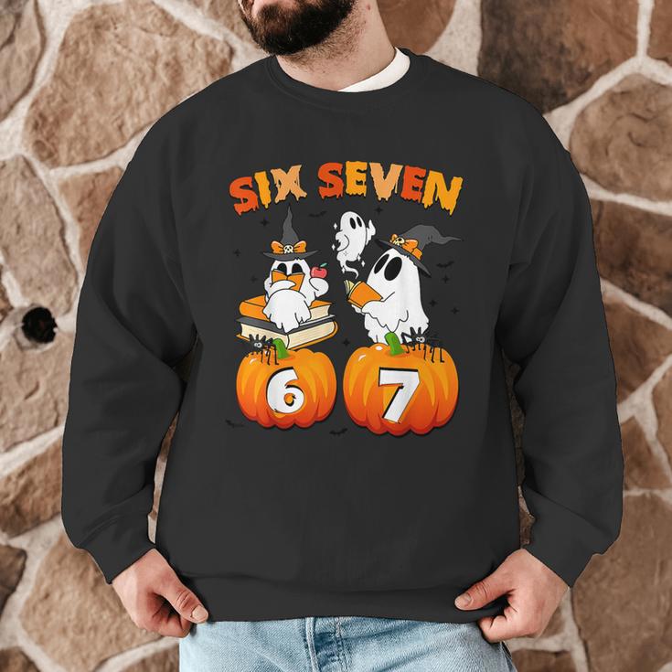 Haunted By 67 Boo Ghost Pumpkin Halloween Teacher Men Graphic Sweatshirt, novelty gifts, funny gifts