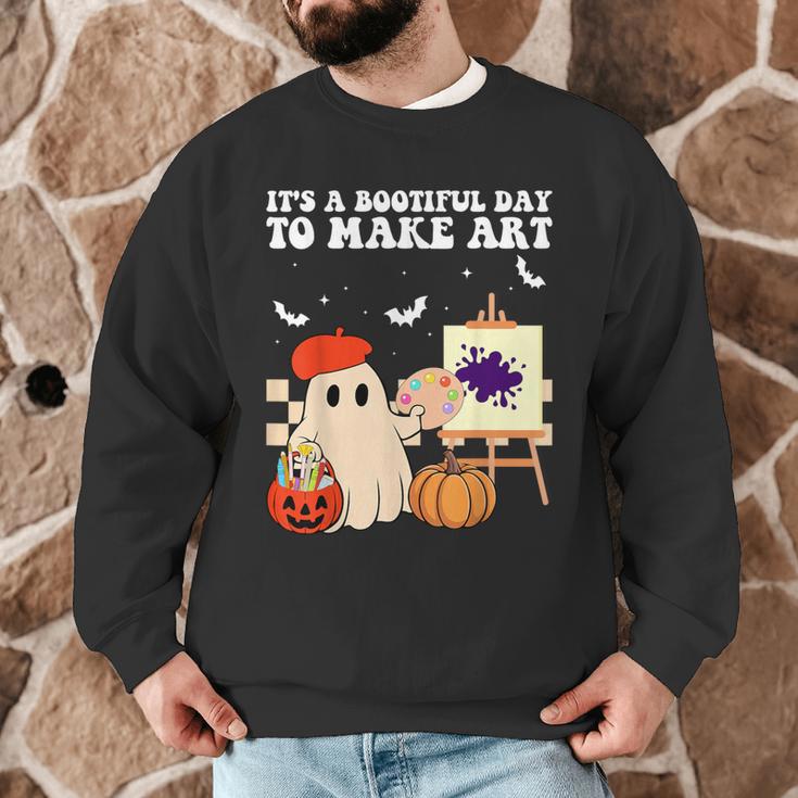 It's A Bootiful Day To Make Art Groovy Art Teacher Halloween Men Graphic Sweatshirt, novelty gifts, funny gifts