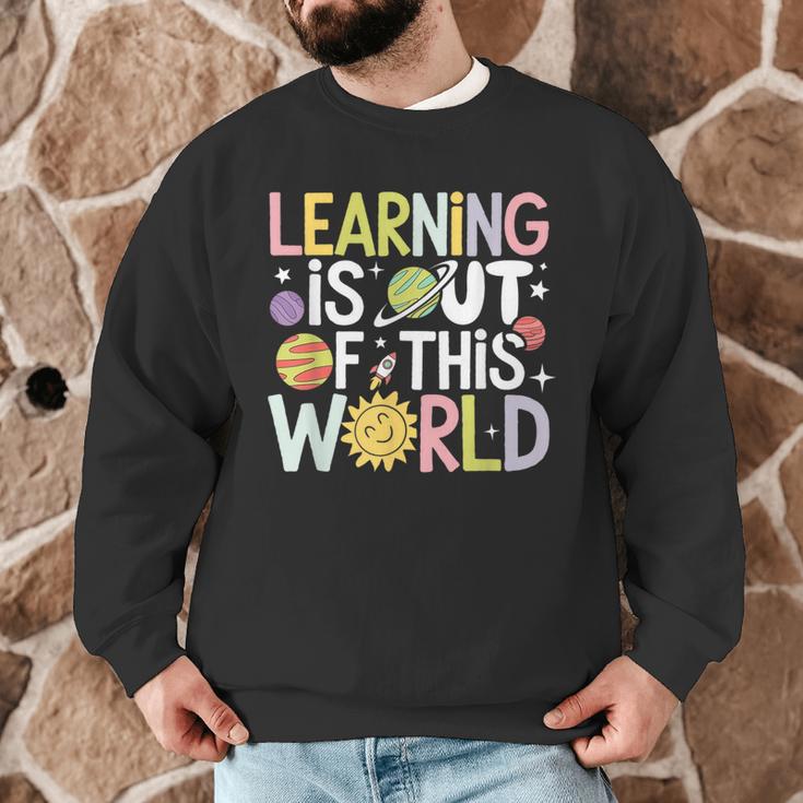Learning Is Out Of This World Space Teacher Cute Groovy Men Graphic Sweatshirt, novelty gifts, funny gifts