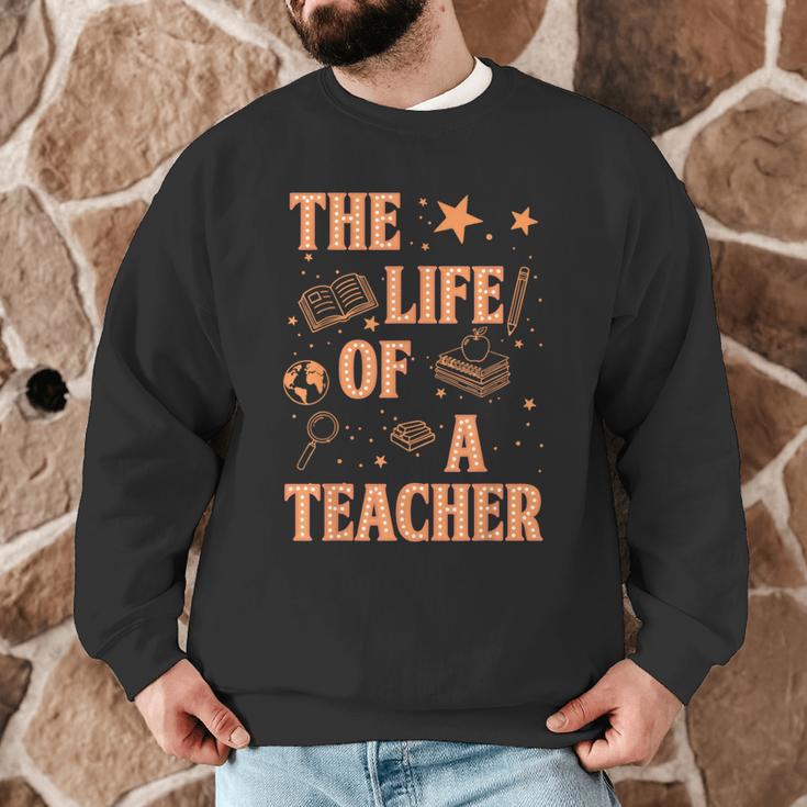 The Life Of A Teacher Back To School Women Men Men Graphic Sweatshirt, novelty gifts, funny gifts