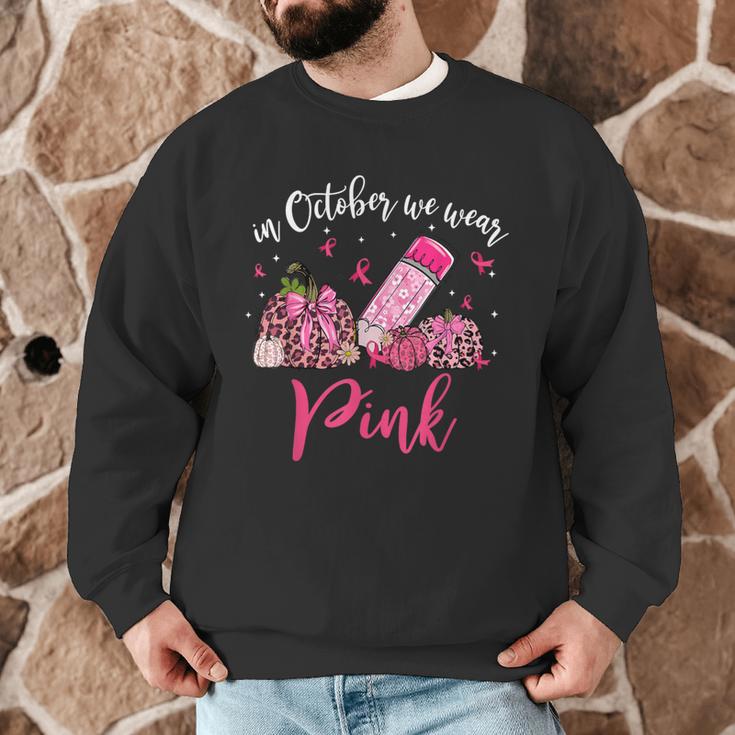 In October We Wear Pink Apple Teacher Daisy Breast Cancer Men Graphic Sweatshirt, novelty gifts, funny gifts