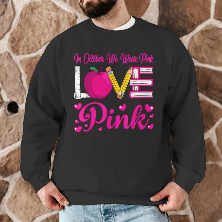 In October We Wear Pink Love Teacher Breast Cancer Awareness Men Graphic Sweatshirt, novelty gifts, funny gifts In October We Wear Pink Love Teacher Breast Cancer Awareness Men Graphic Sweatshirt, novelty gifts, funny gifts