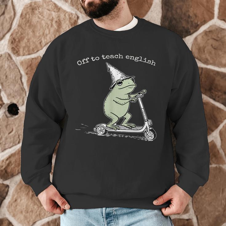 Off To Teach English Scooter Frog ESL Teacher Literature Men Graphic Sweatshirt, novelty gifts, funny gifts Off To Teach English Scooter Frog ESL Teacher Literature Men Graphic Sweatshirt, novelty gifts, funny gifts