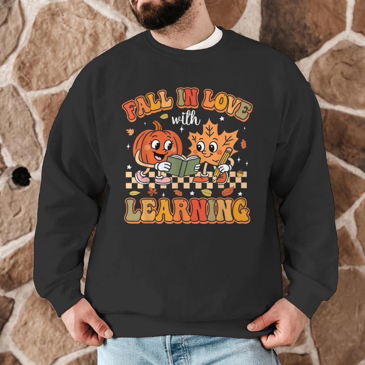 Retro Fall In Love With Learning Autumn Pumpkin Teachers Men Graphic Sweatshirt, novelty gifts, funny gifts