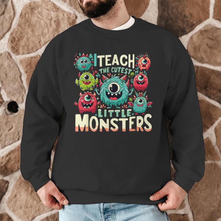I Teach The Cutest Little Monsters Teacher Halloween Outfit Men Graphic Sweatshirt, novelty gifts, funny gifts