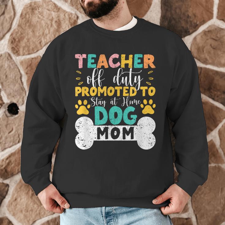 Teacher Off Duty Promoted To Stay At Home Dog Mom Teachers Men Graphic Sweatshirt, novelty gifts, funny gifts Teacher Off Duty Promoted To Stay At Home Dog Mom Teachers Men Graphic Sweatshirt, novelty gifts, funny gifts