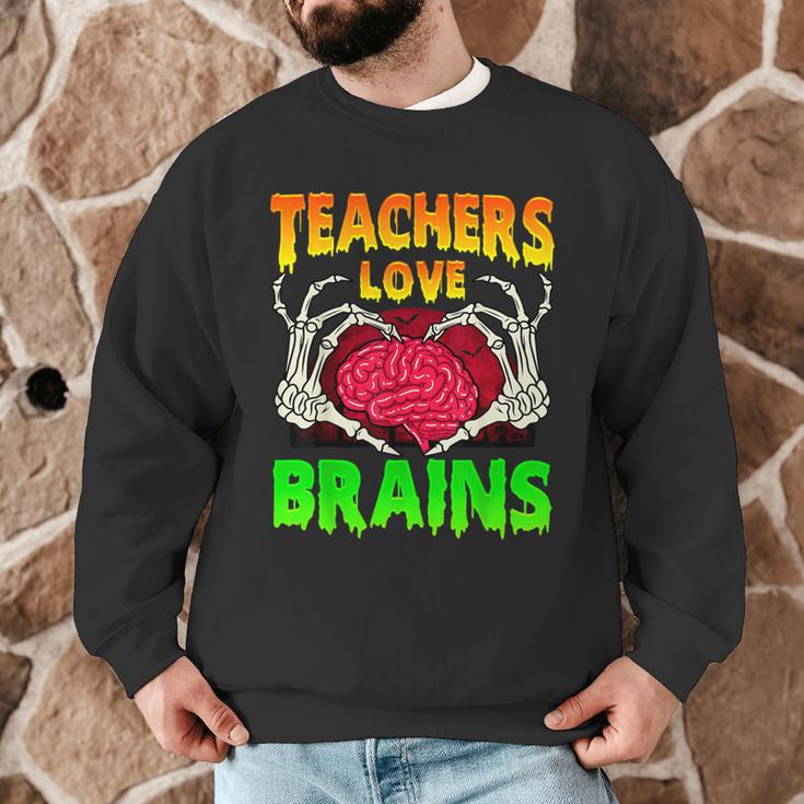 Teacher Teachers Love Brains Skeleton Hand Heart Halloween Men Graphic Sweatshirt, novelty gifts, funny gifts Teacher Teachers Love Brains Skeleton Hand Heart Halloween Men Graphic Sweatshirt, novelty gifts, funny gifts