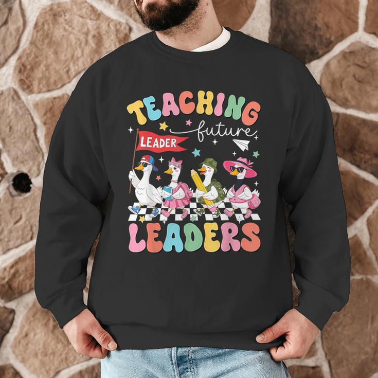 Teaching Future Leaders Groovy Teacher Back To School Men Graphic Sweatshirt, novelty gifts, funny gifts Teaching Future Leaders Groovy Teacher Back To School Men Graphic Sweatshirt, novelty gifts, funny gifts