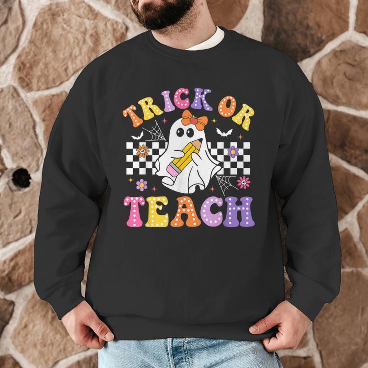 Trick Or Teach Groovy Halloween Teachers Men Graphic Sweatshirt, novelty gifts, funny gifts Trick Or Teach Groovy Halloween Teachers Men Graphic Sweatshirt, novelty gifts, funny gifts