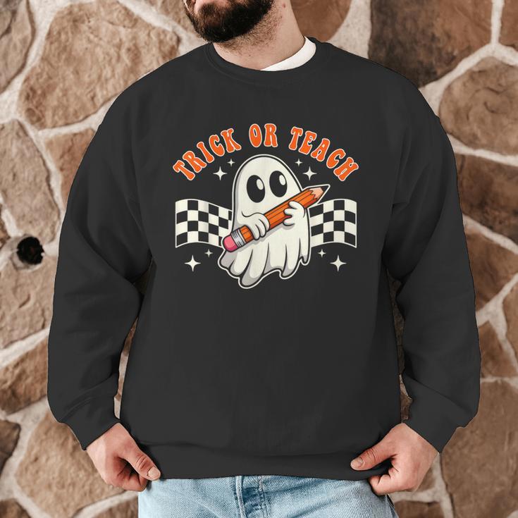 Trick Or Teach Groovy Retro Ghost Halloween Teacher Kids Men Graphic Sweatshirt, novelty gifts, funny gifts