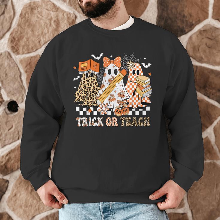 Trick Or Teach Groovy Teacher Halloween Floral Ghost Men Graphic Sweatshirt, novelty gifts, funny gifts Trick Or Teach Groovy Teacher Halloween Floral Ghost Men Graphic Sweatshirt, novelty gifts, funny gifts
