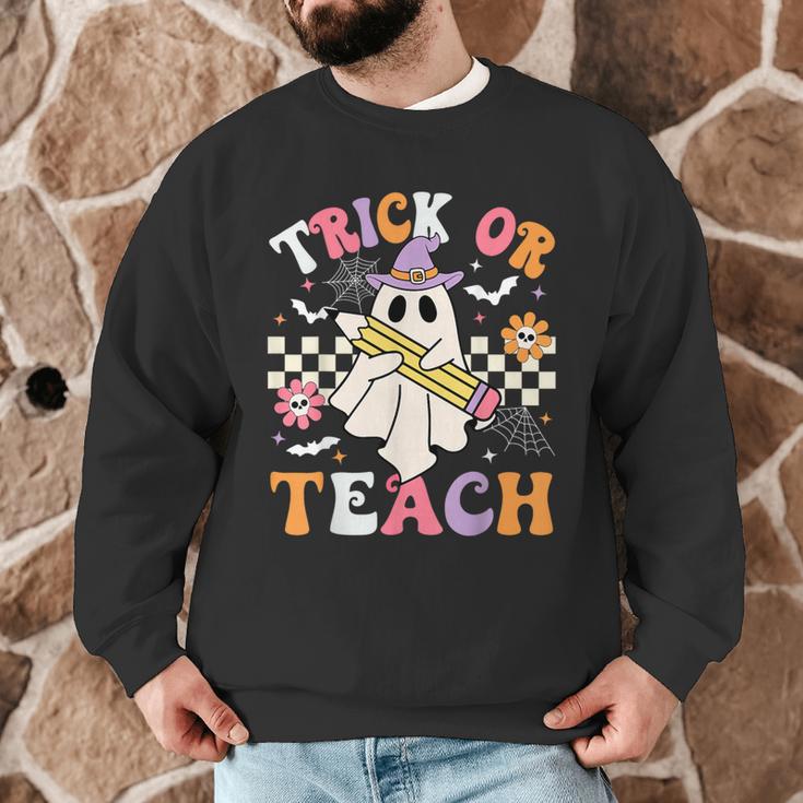 Trick Or Teach Groovy Teacher Halloween Retro Teacher Ghost Men Graphic Sweatshirt, novelty gifts, funny gifts Trick Or Teach Groovy Teacher Halloween Retro Teacher Ghost Men Graphic Sweatshirt, novelty gifts, funny gifts