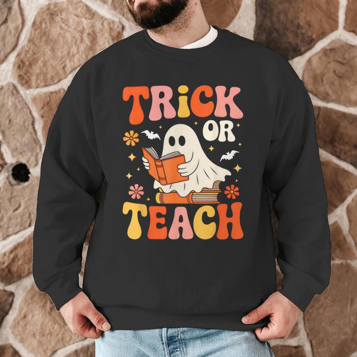 Trick Or Teach Halloween Shirt For Teacher Kids Floral Ghost Men Graphic Sweatshirt, novelty gifts, funny gifts Trick Or Teach Halloween Shirt For Teacher Kids Floral Ghost Men Graphic Sweatshirt, novelty gifts, funny gifts