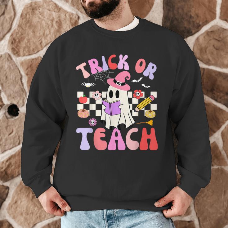 Trick Or Teach Halloween Teacher Floral Ghost Groovy Men Graphic Sweatshirt, novelty gifts, funny gifts Trick Or Teach Halloween Teacher Floral Ghost Groovy Men Graphic Sweatshirt, novelty gifts, funny gifts