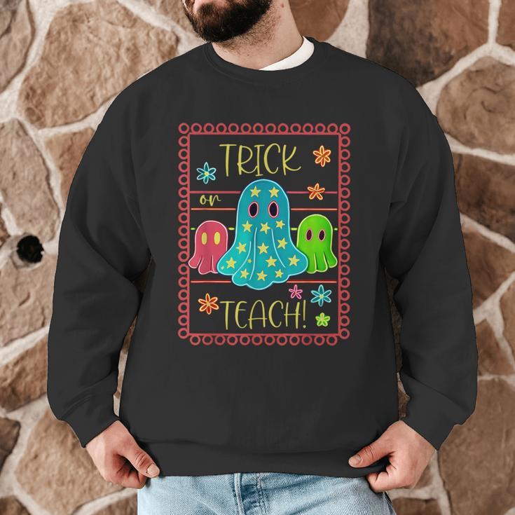 Trick Or Teach Neon Ghost Flower Teacher Spooky Halloween Men Graphic Sweatshirt, novelty gifts, funny gifts Trick Or Teach Neon Ghost Flower Teacher Spooky Halloween Men Graphic Sweatshirt, novelty gifts, funny gifts