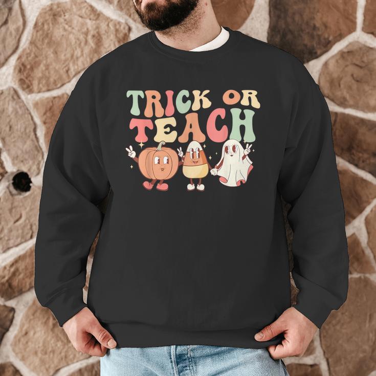 Trick Or Teach Pumpkin Candy Corn Ghost Halloween Teacher Men Graphic Sweatshirt, novelty gifts, funny gifts Trick Or Teach Pumpkin Candy Corn Ghost Halloween Teacher Men Graphic Sweatshirt, novelty gifts, funny gifts