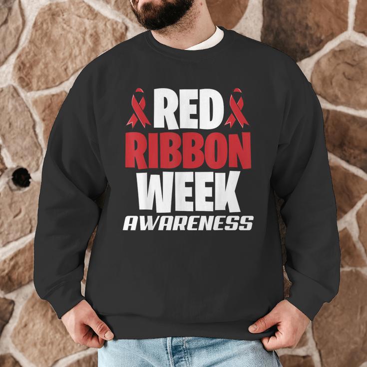 We Wear Red For Red Ribbon Week Awareness Mothers Teachers Men Graphic Sweatshirt, novelty gifts, funny gifts We Wear Red For Red Ribbon Week Awareness Mothers Teachers Men Graphic Sweatshirt, novelty gifts, funny gifts