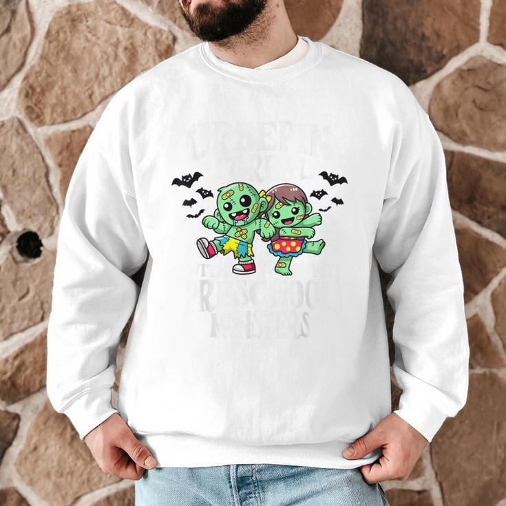 Creepin It Real Monster School Preschool Teacher Halloween Men Graphic Sweatshirt, novelty gifts, funny gifts