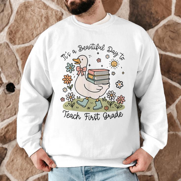 Cute Goose It's A Beautiful Day To Teach 1st Grade Teacher Men Graphic Sweatshirt, novelty gifts, funny gifts