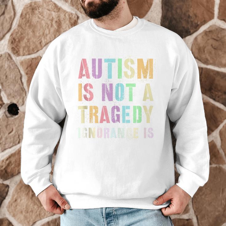 Kids AUTISM IS NOT A TRAGEDY IGNORANCE IS Proud Teacher Crew Men Graphic Sweatshirt, novelty gifts, funny gifts