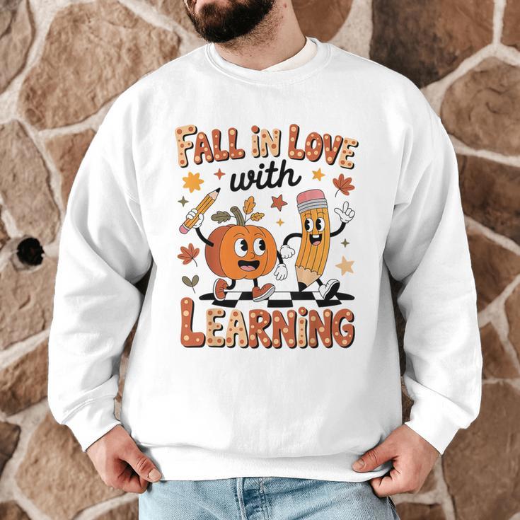 Retro Fall In Love With Learning Autumn Pumpkin Teacher Kids Men Graphic Sweatshirt, novelty gifts, funny gifts