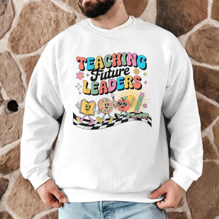 Retro Teaching Future Leaders Groovy Teacher Back To School Men Graphic Sweatshirt, novelty gifts, funny gifts