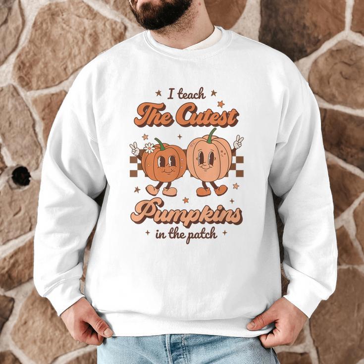 I Teach The Cutest Pumpkins In The Patch Retro Teacher Fall Men Graphic Sweatshirt, novelty gifts, funny gifts