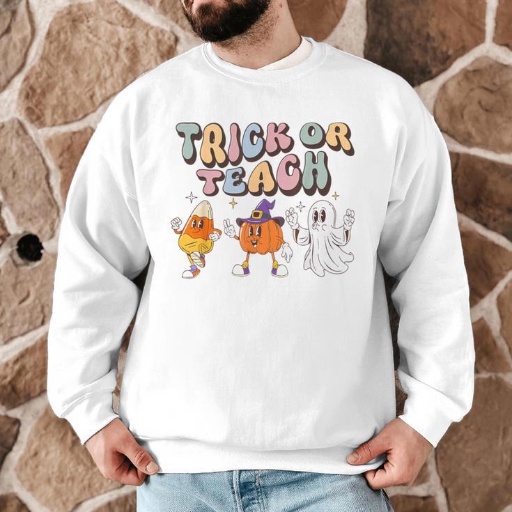 Trick Or Teach Candy Corn Pumpkin Ghost Teacher Men Graphic Sweatshirt, novelty gifts, funny gifts Trick Or Teach Candy Corn Pumpkin Ghost Teacher Men Graphic Sweatshirt, novelty gifts, funny gifts
