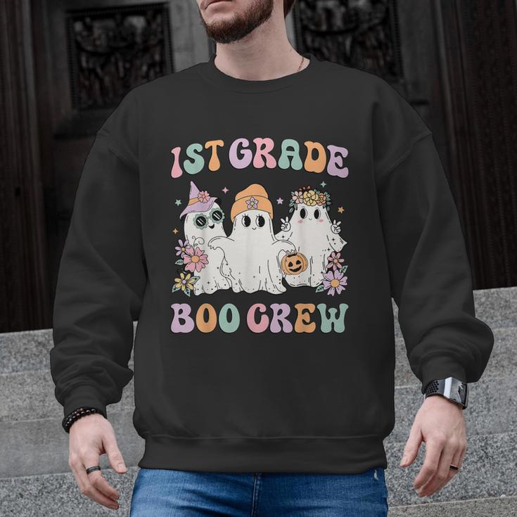 1st Grade Boo Crew Groovy Halloween Floral Ghost Kid Teacher Men Graphic Sweatshirt