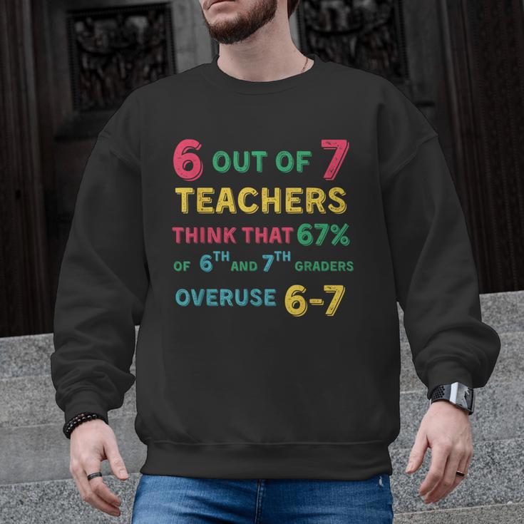 67 Teacher Middle School Teacher 6 7 Overuse 67 Men Graphic Sweatshirt