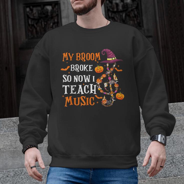 My Broom Broke So Now I Teach Music Teacher Halloween Men Graphic Sweatshirt