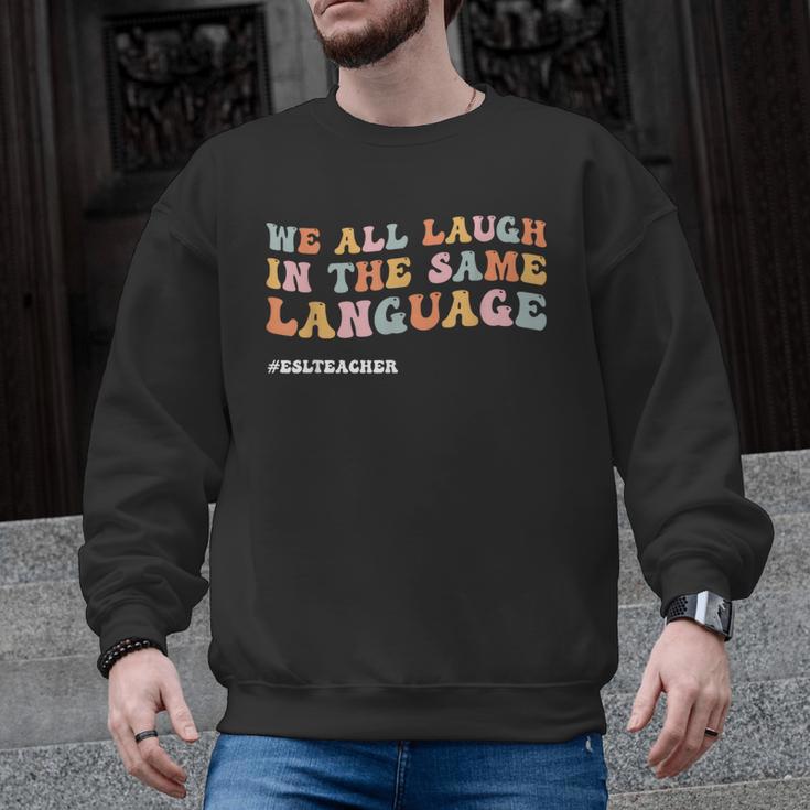 ESL Teacher We All Laugh In The Same Language Men Graphic Sweatshirt