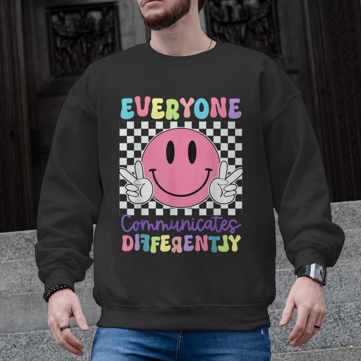 Everyone Communicates Differently Autism Awareness Teacher Men Graphic Sweatshirt