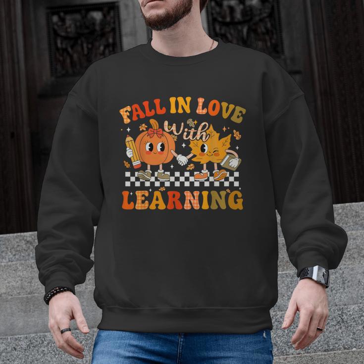 Fall In Love With Learning Autumn Pumpkin Fall Teacher Kids Men Graphic Sweatshirt