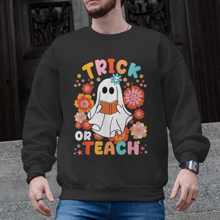 Groovy Halloween Trick Or Teach Retro Floral Ghost Teacher For Men Women Kids Men Graphic Sweatshirt