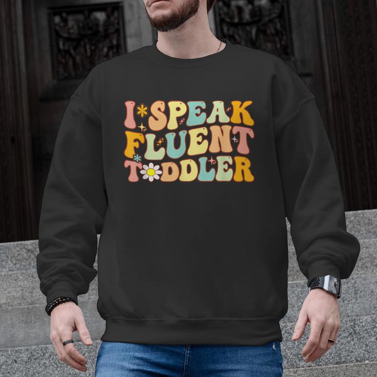 Groovy I Speak Fluent Toddler Daycare Provider Teacher Men Graphic Sweatshirt