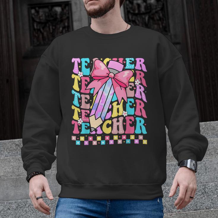 Groovy Teacher Cute Coquette Bow Flower Retro Back To School Men Graphic Sweatshirt