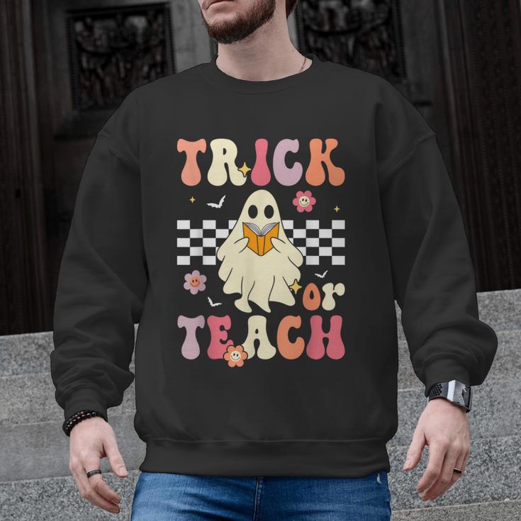 Groovy Teacher Halloween Retro Trick Or Teach Floral Ghost Men Graphic Sweatshirt