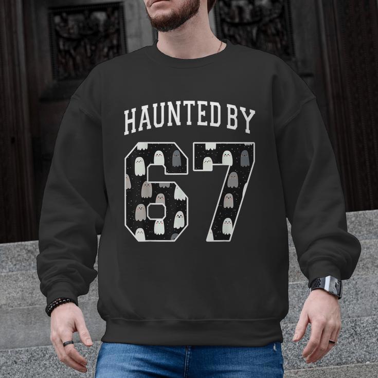 Haunted By 6 7 67 Six Seven Halloween Teacher Mom Men Graphic Sweatshirt