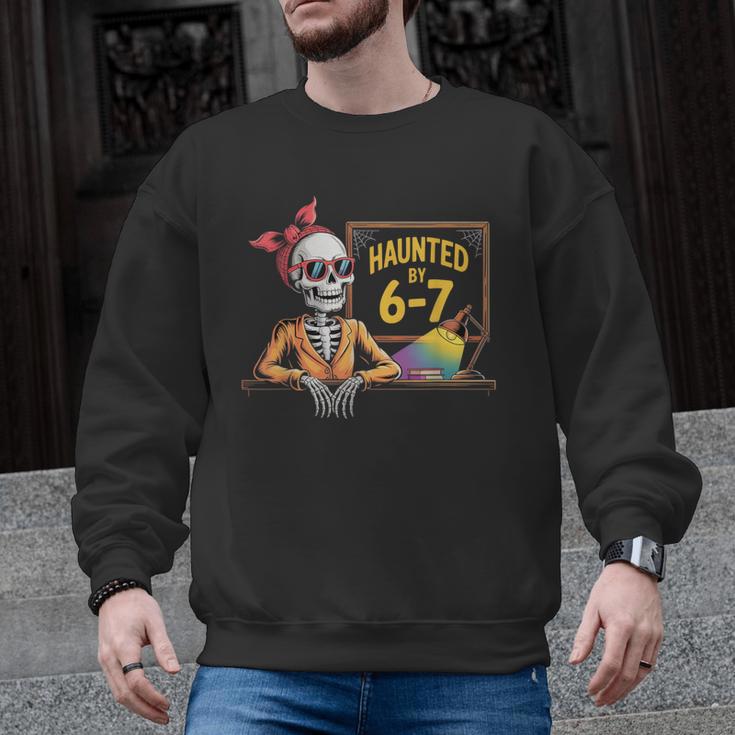 Haunted By 6-7 Teacher Halloween 67 Men Graphic Sweatshirt