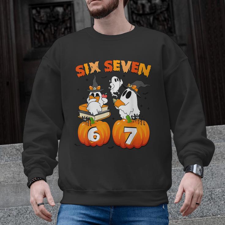 Haunted By 67 Boo Ghost Pumpkin Halloween Teacher Men Graphic Sweatshirt