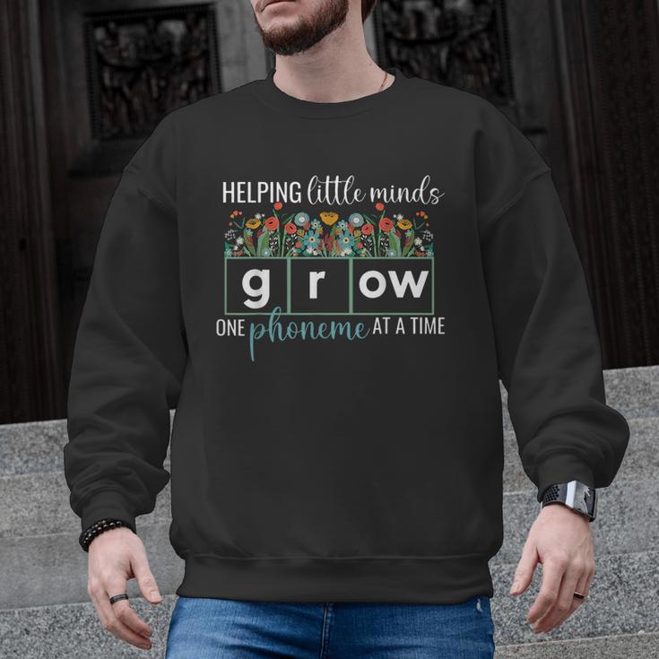 Helping Little Minds Grow One Phoneme At A Time Teacher Men Graphic Sweatshirt