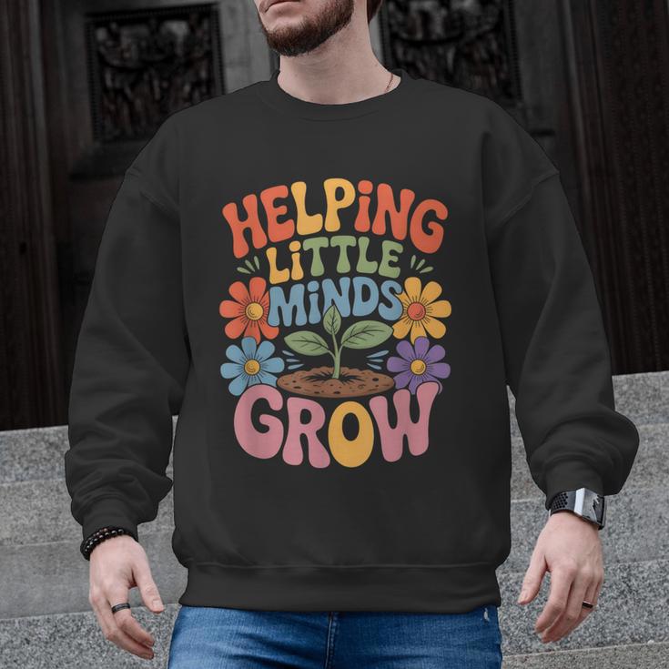 Helping Little Minds Grow Teacher First Day Back To School Men Graphic Sweatshirt